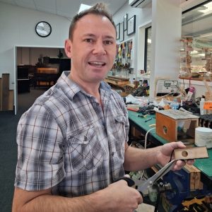 Nathan Smith working in Hamilton Piano Company's workshop